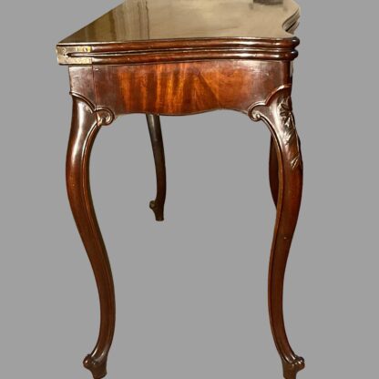George III mahogany serpentine card table open