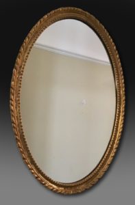 Mid 19th century giltwood mirror of small size with original gilding. The original glass has been replaced but can be supplied. English C1865