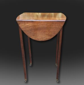 A really, really small George III mahogany oval Pembroke table
