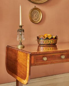 Sofa Table folded with candle and fruit bowl