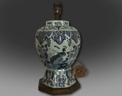 An 18th century Delft blue and white octagonal rippled vase back