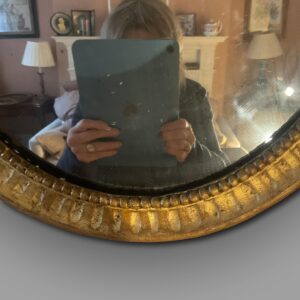 George III late 18th century oval giltwood mirror close up
